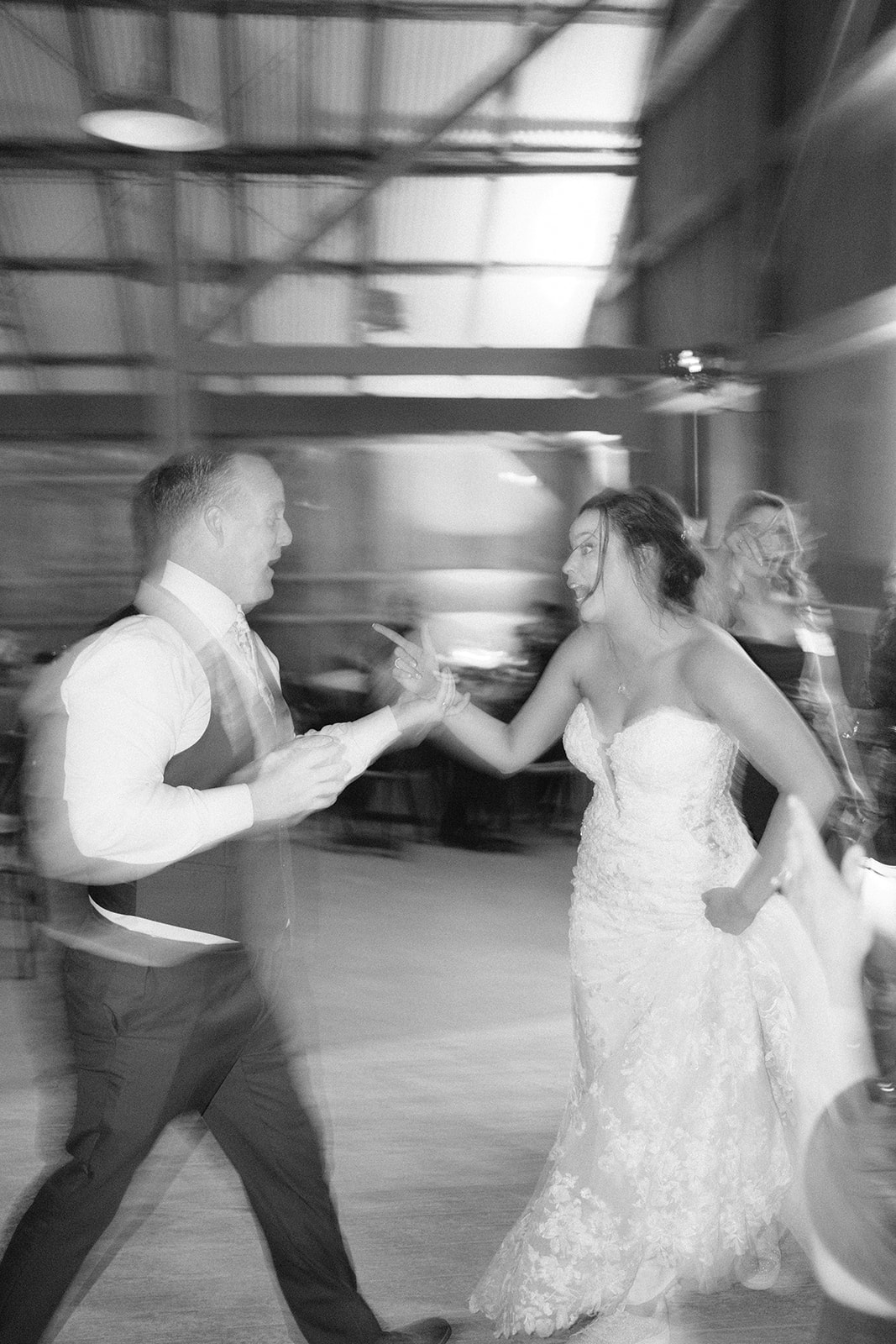 bride and groom dancing with each other at The White Barn in San Luis Obispo CA, photography by Cobblestone