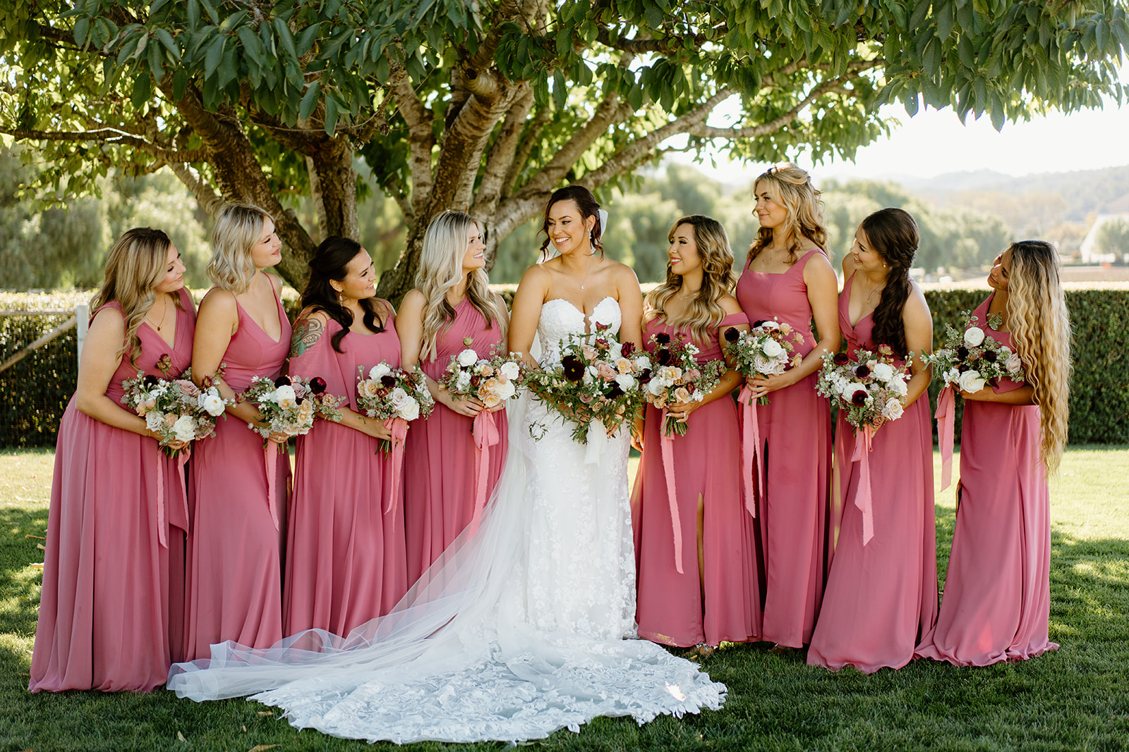 Bridesmaids gather in a group at The White Barn in San Luis Obispo CA, photography by Cobblestone