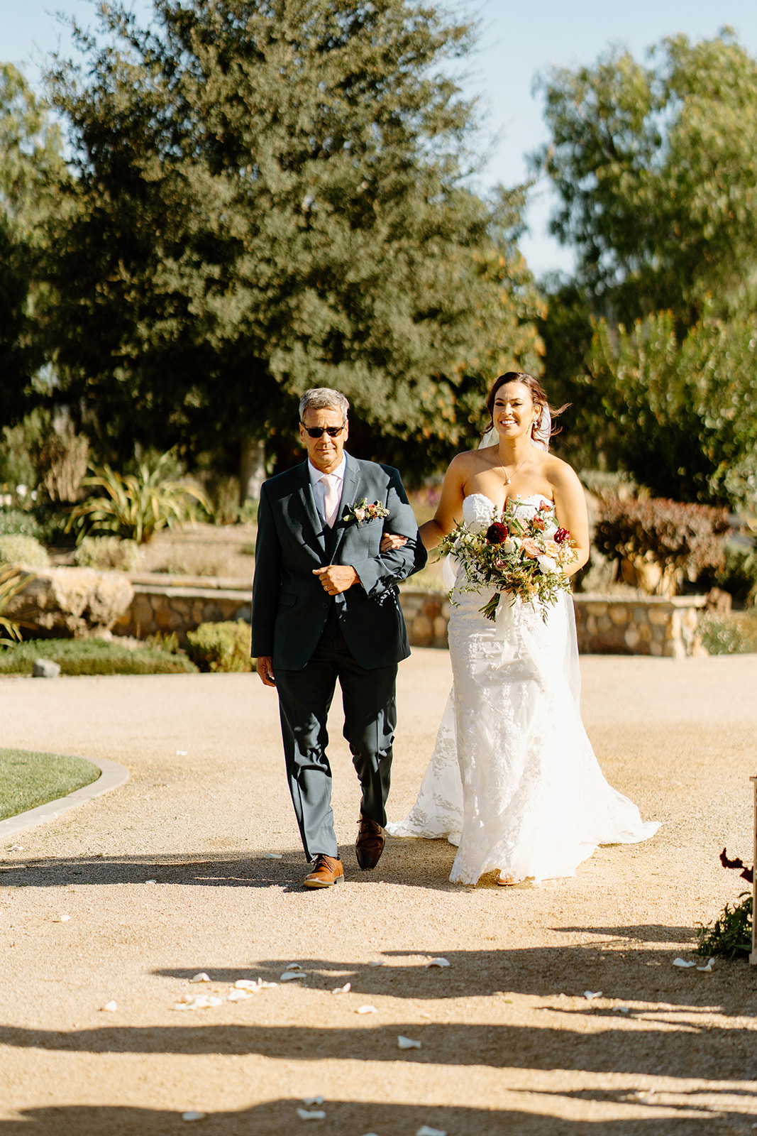Bride walks down the isle at The White Barn in San Luis Obispo CA, photography by Cobblestone