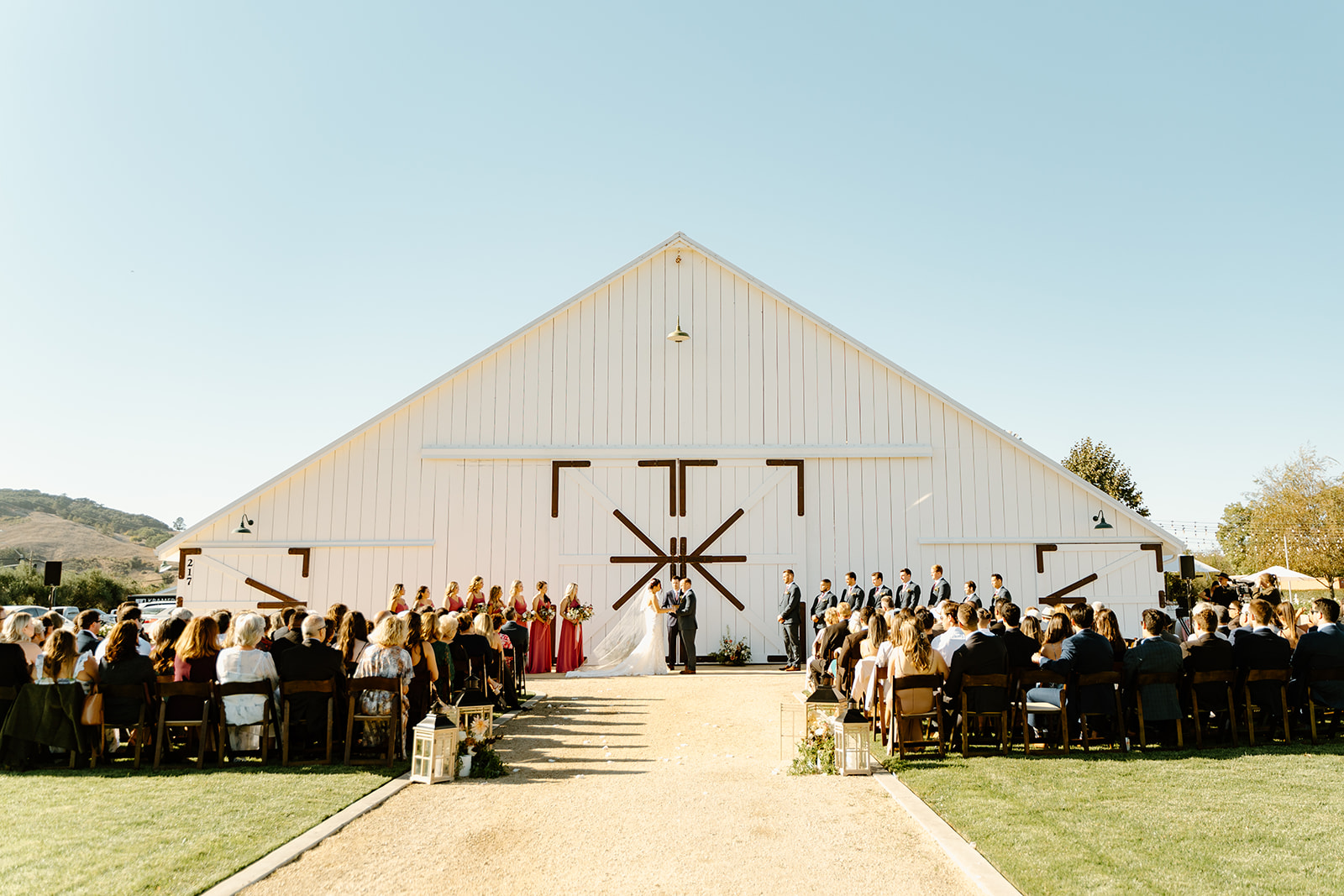 Bride and groom at alter at The White Barn in San Luis Obispo CA, photography by Cobblestone
