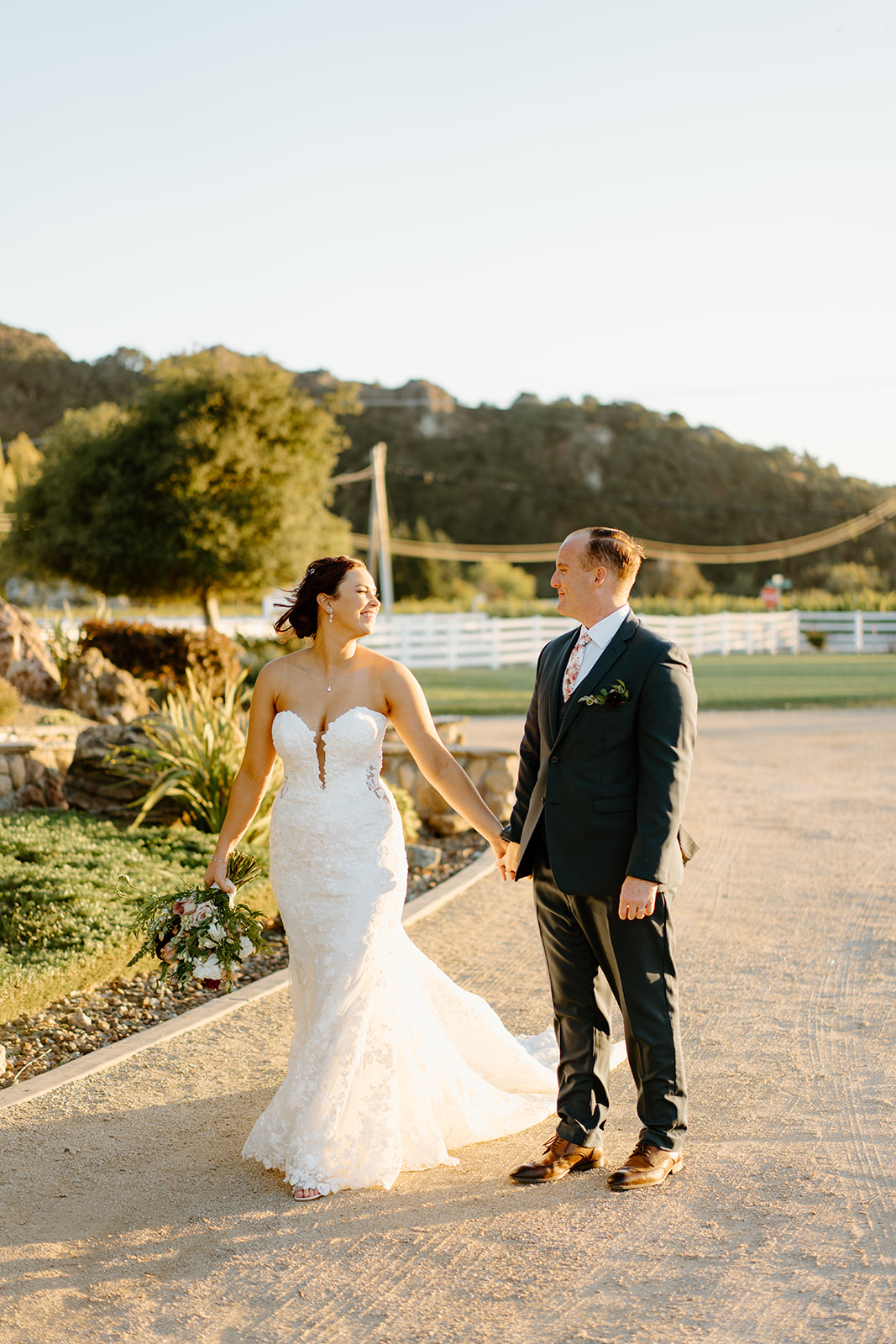 Bride and groom walk the grounds at The White Barn in San Luis Obispo CA, photography by Cobblestone