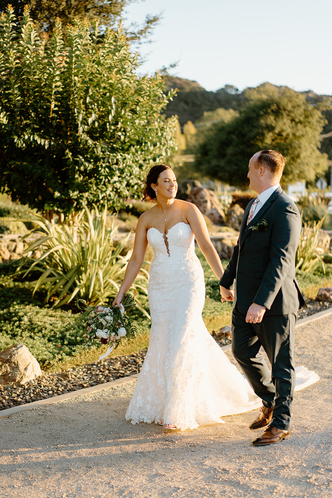 Bride and groom walk the grounds at The White Barn in San Luis Obispo CA, photography by Cobblestone