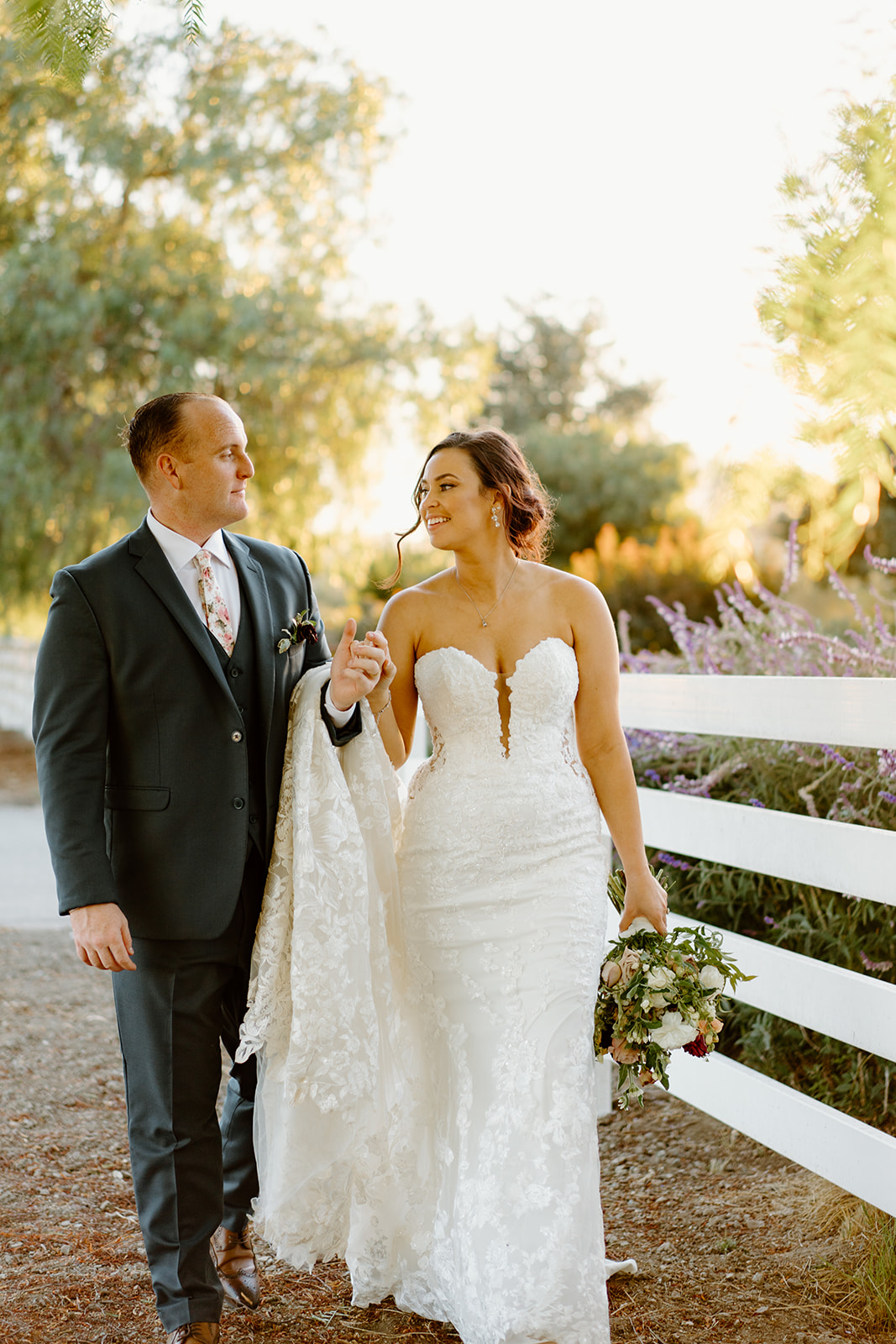 Bride and groom walk the grounds at The White Barn in San Luis Obispo CA, photography by Cobblestone